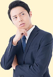 悩んでいる男性